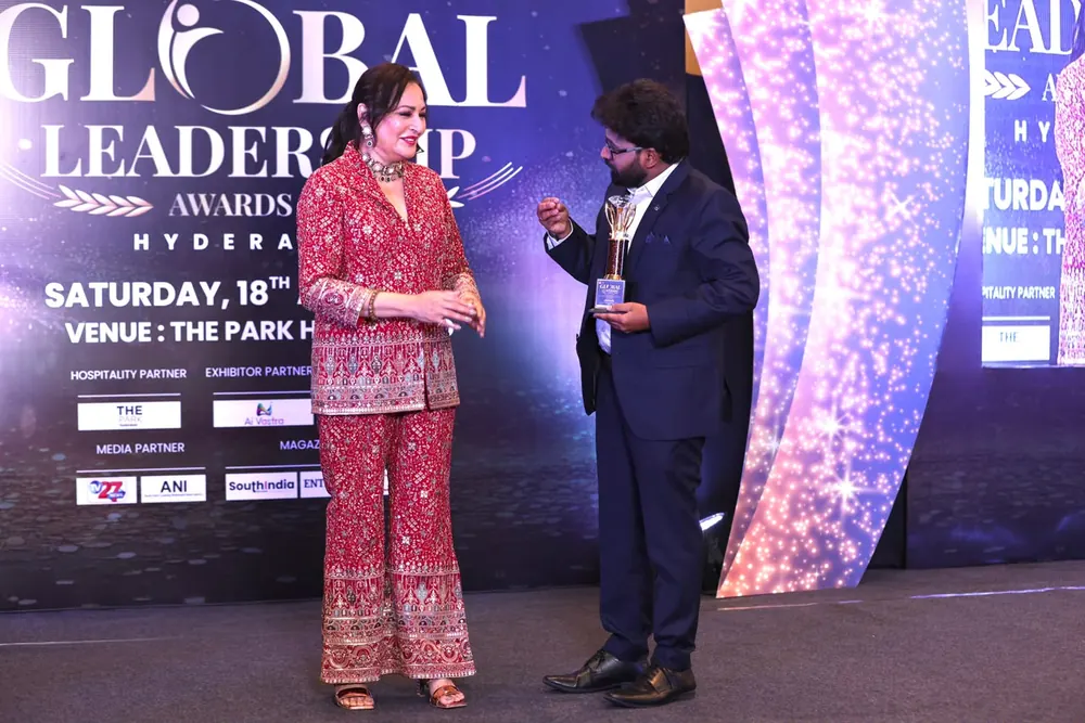 Global Leadership Awards stage moment for trusted real estate company recognition