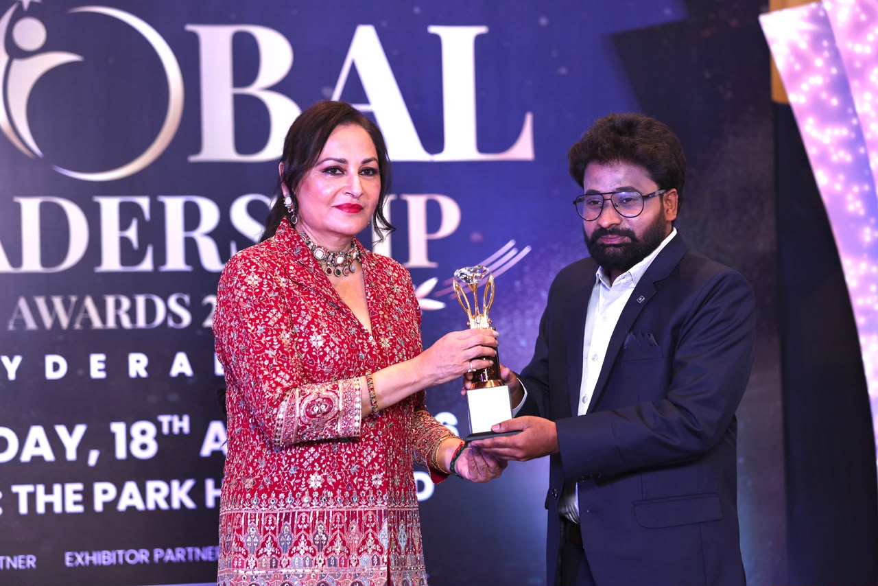 Most Trusted Real Estate Company in Telangana 2026 trophy presentation